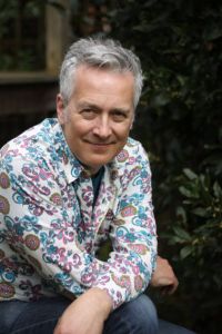 Autor*innenportrait von John Dougherty